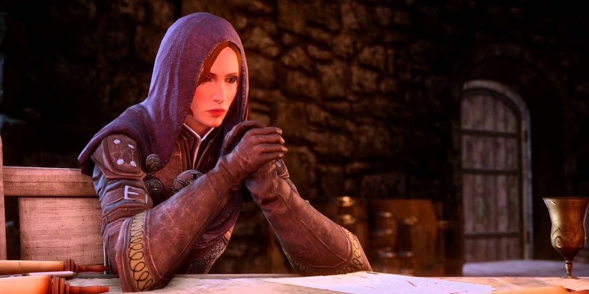 Leliana sitting at table.