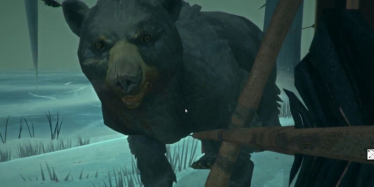 The Long Dark Bear Close To The Player Holding A Strung Bow In A Cave Beside Frozen Lake