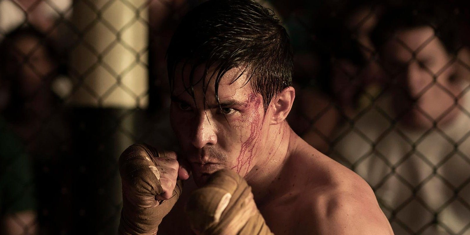 Cole Young fighting in an MMA fight in the new Mortal Kombat film