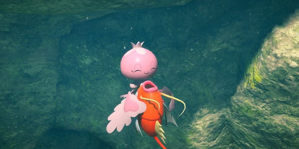 New Pokémon Snap Frillish eating Magikarp dragging down