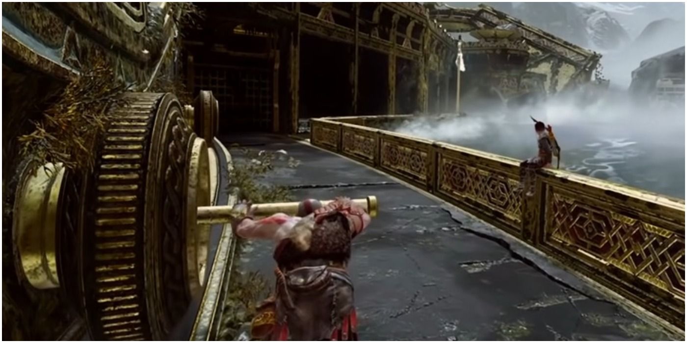 God of War - Kratos pushing a whole bidge