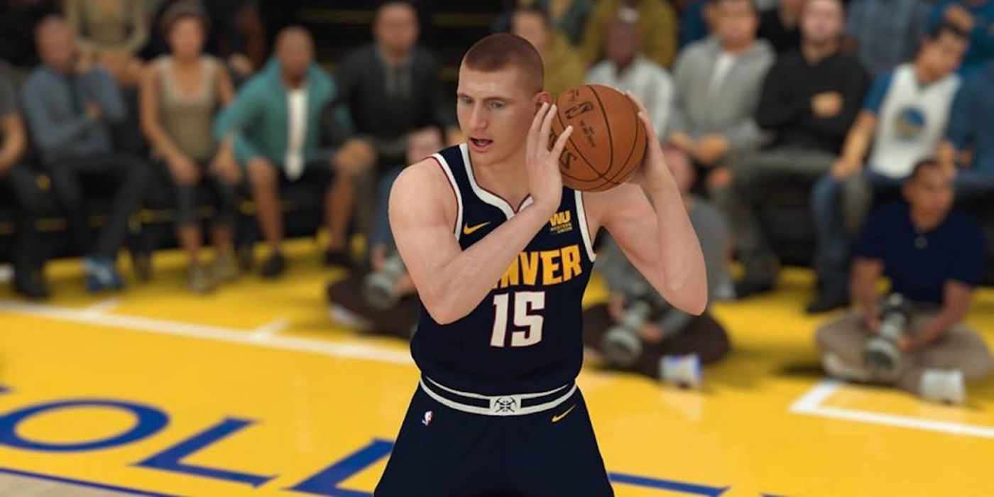Nikola Jokic Holding Basketball NBA 2K