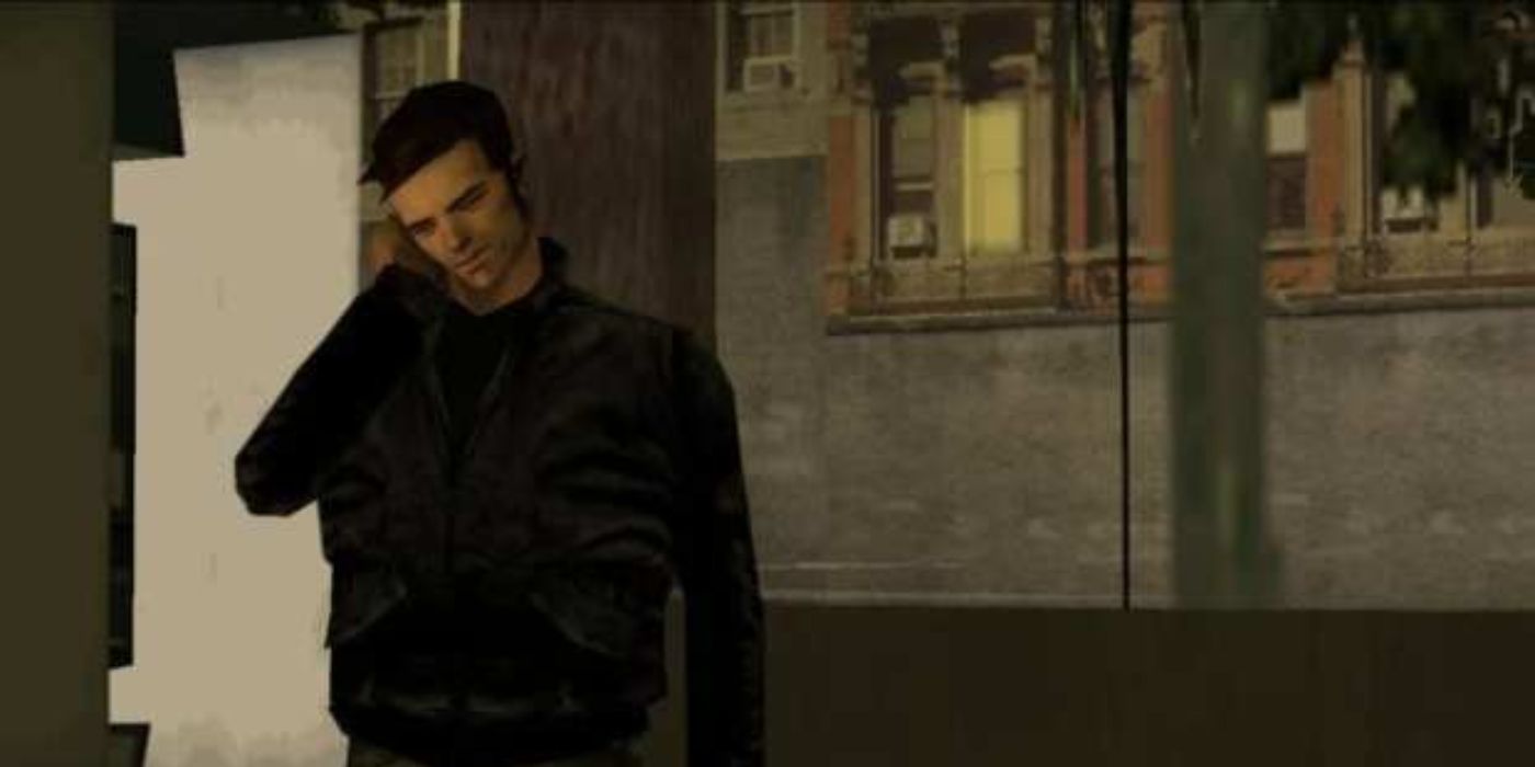 Claude shows no emotion as he talks to an employer on a payphone