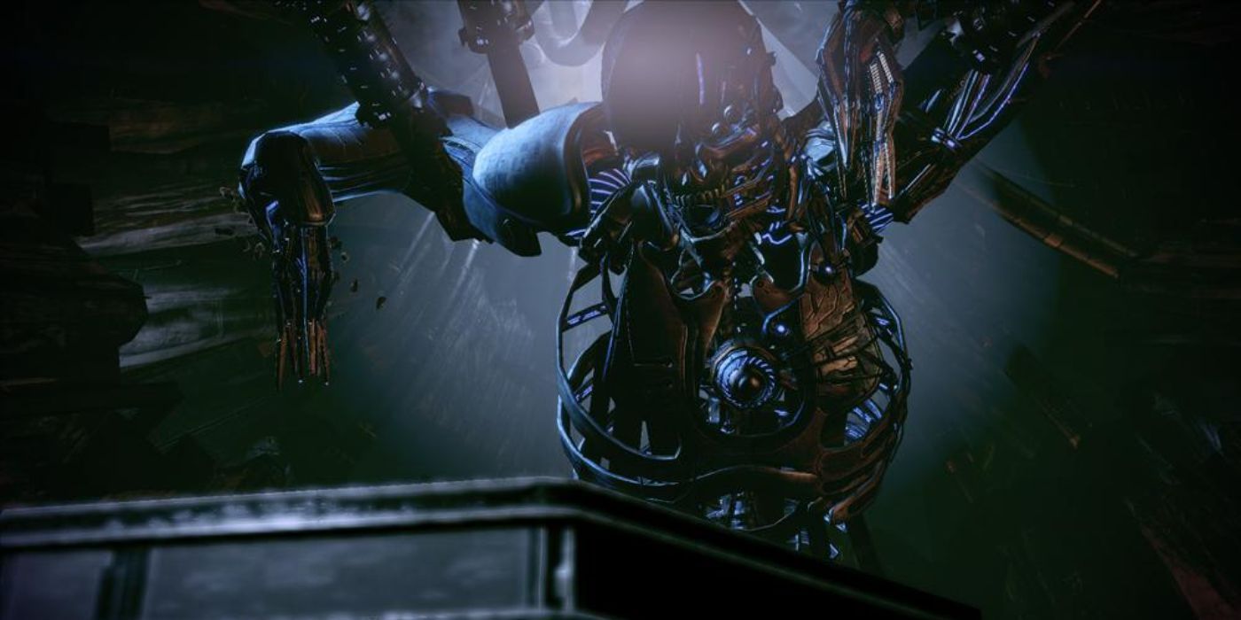 The human Reaper is suspended inside the heart of the Collector Base