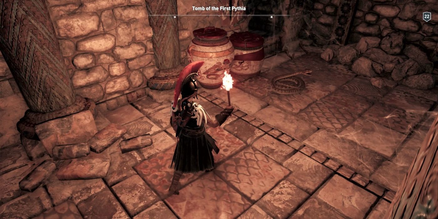 Kassandra explores The Tomb of the First Pythia, with a torch in-hand- where a stele piece lies within