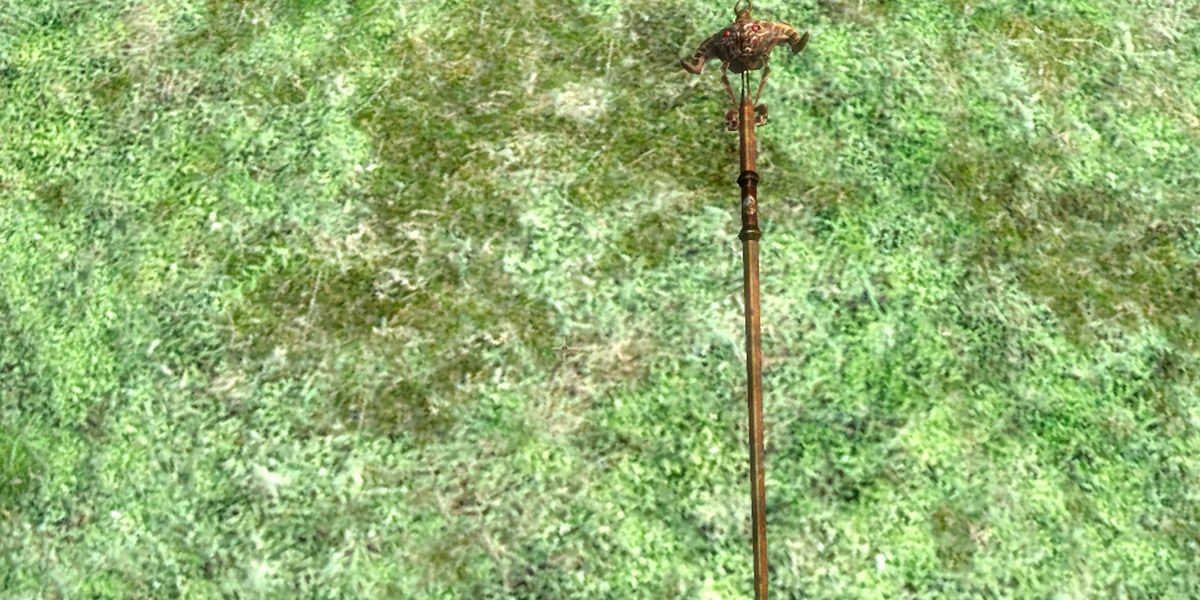 The Skull of Corruption laying on the grassy ground near Vaermina's Shrine.