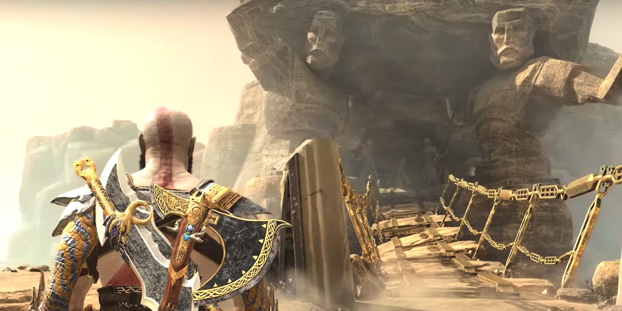 Kratos walks along the path of Jotunheim in God of War.
