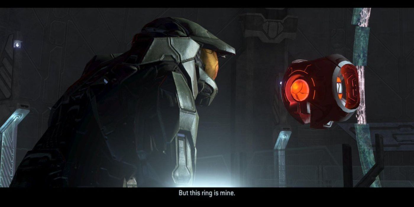 Guilty Spark (right) tries to stop Chief from activating the ring, saying "This ring is mine."