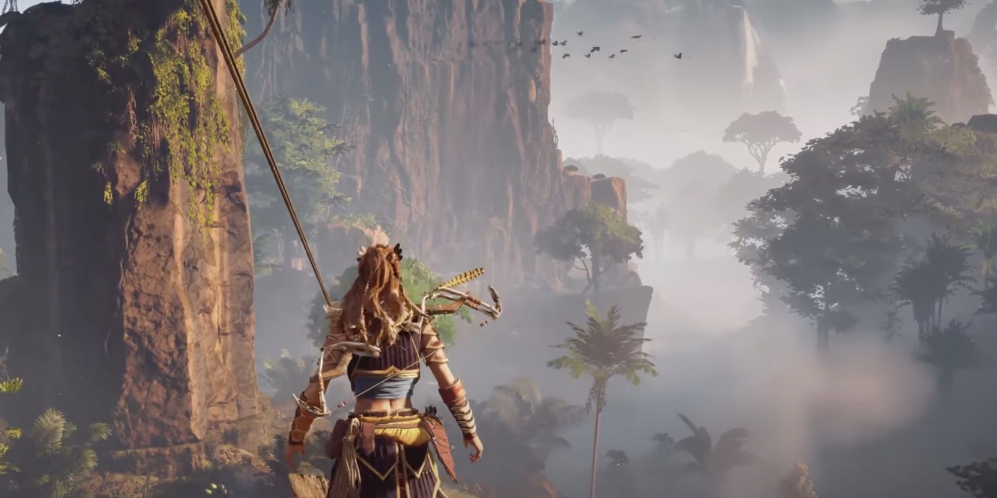 Aloy examines the world around her from a higher perspective in Horizon Zero Dawn