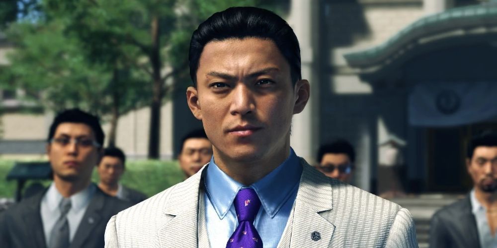 Yakuza 6 Takumi Someya and his Tojo Clan henchmen behind him