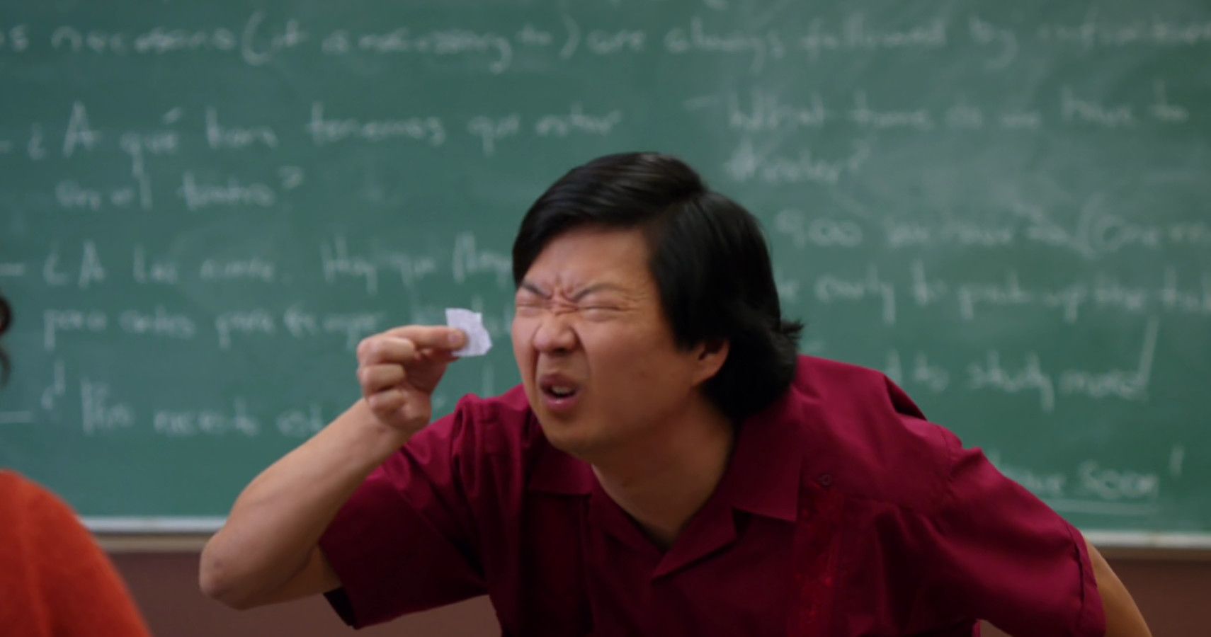 the meme of ken jeong in community looking at a tiny piece of paper