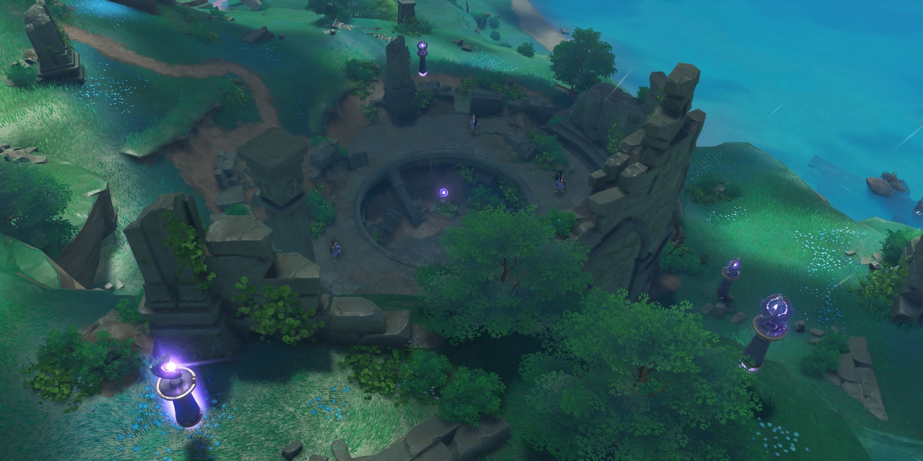 Top down view of grassy ruins with a few purple glowing pillars