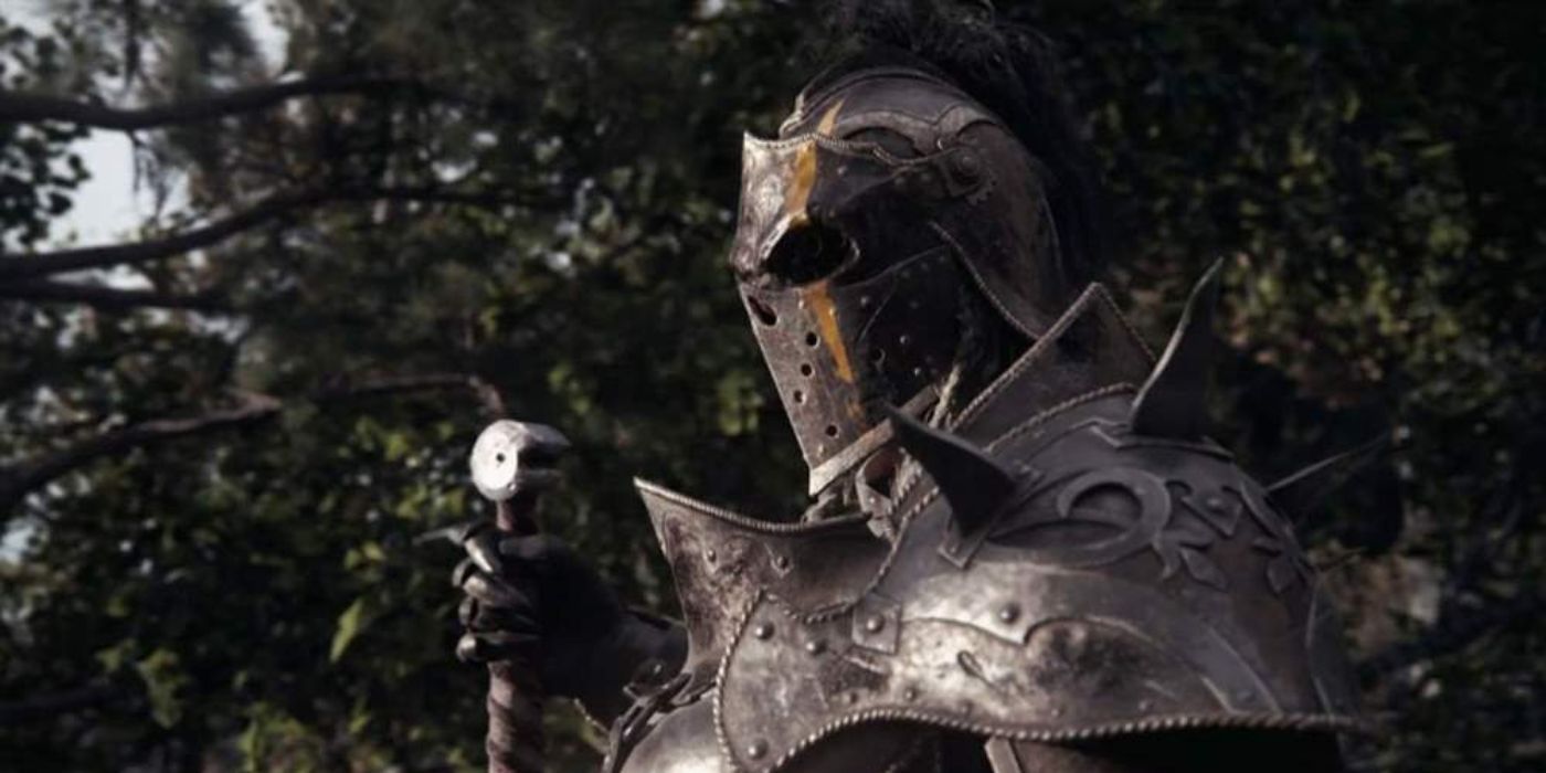 Apollyon watches a battle unfold (off-screen) during For Honor's launch intro
