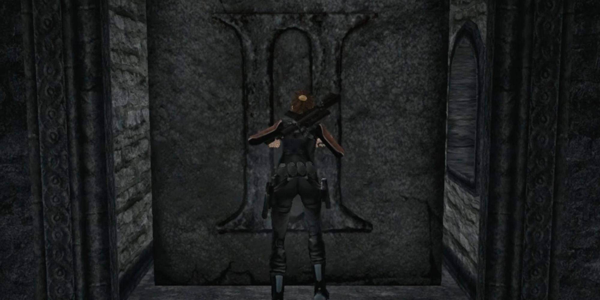 Lara pushing the second block into place for the gold reward in England, Tomb Raider Legend.