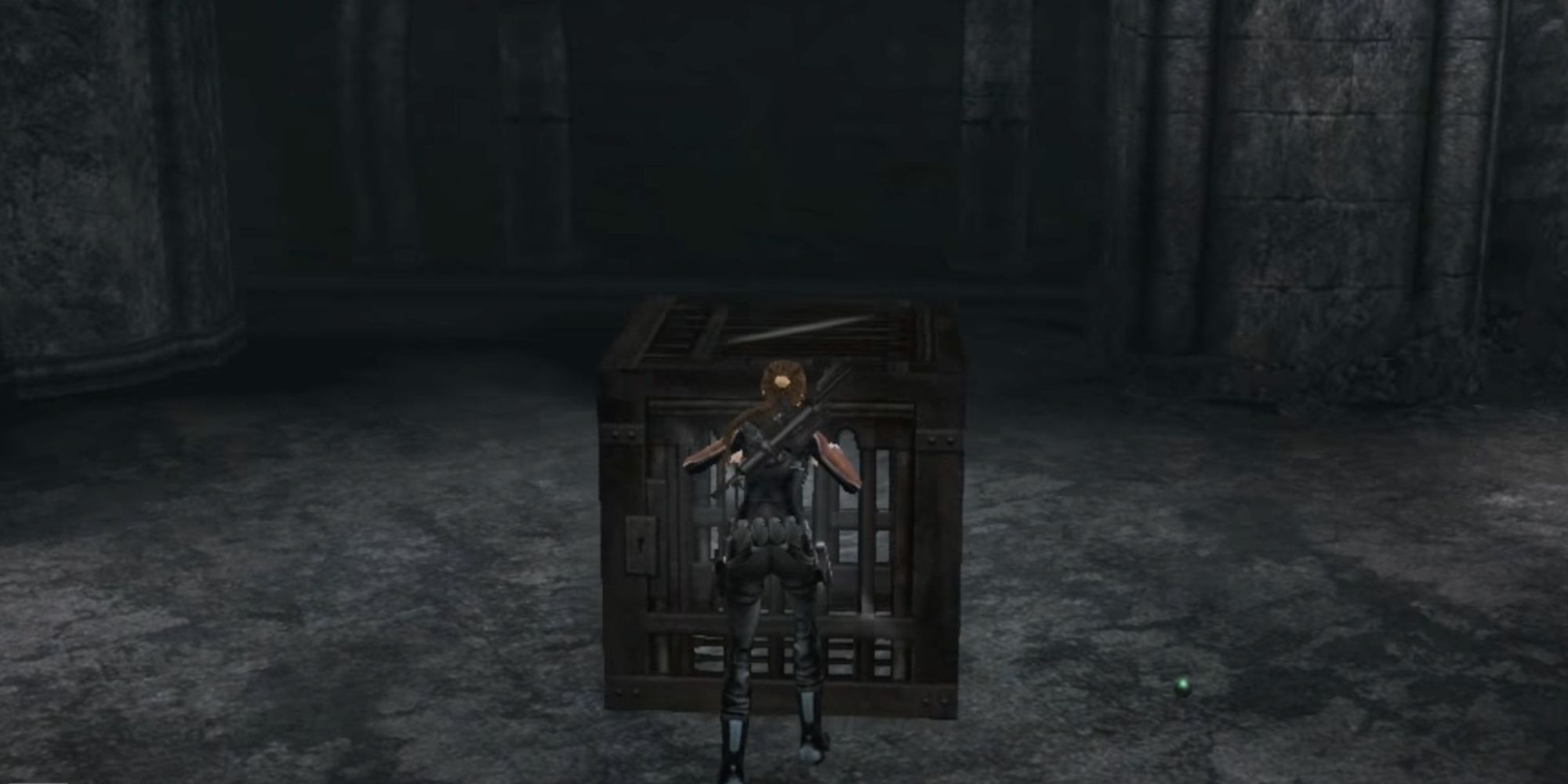 Lara pushing the crate to the ledge on the right in England to obtain the gold reward. Tomb Raider: Legend.