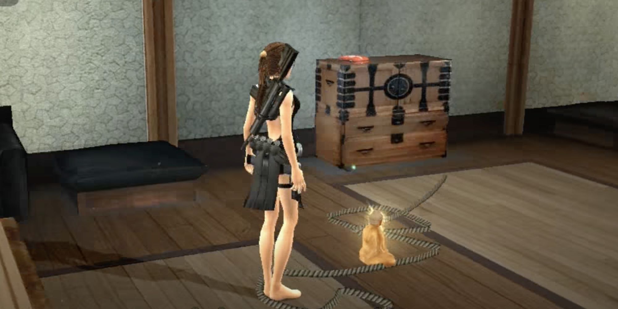 Lara standing in front of the gold reward in Japan in Tomb Raider Legend.