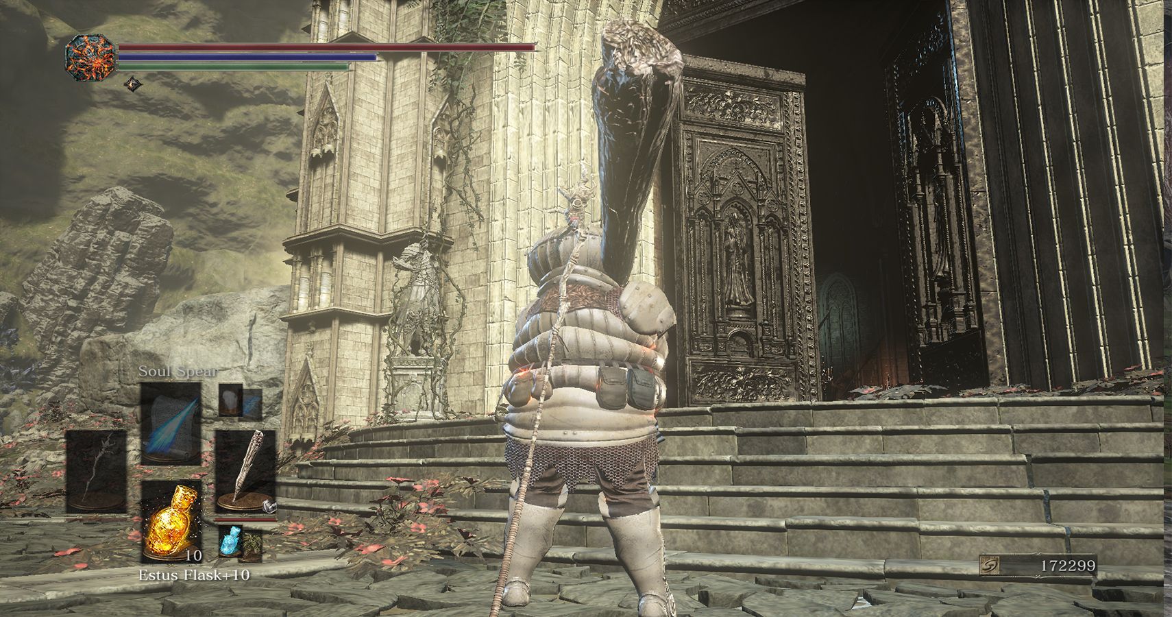 player standing before large church doors