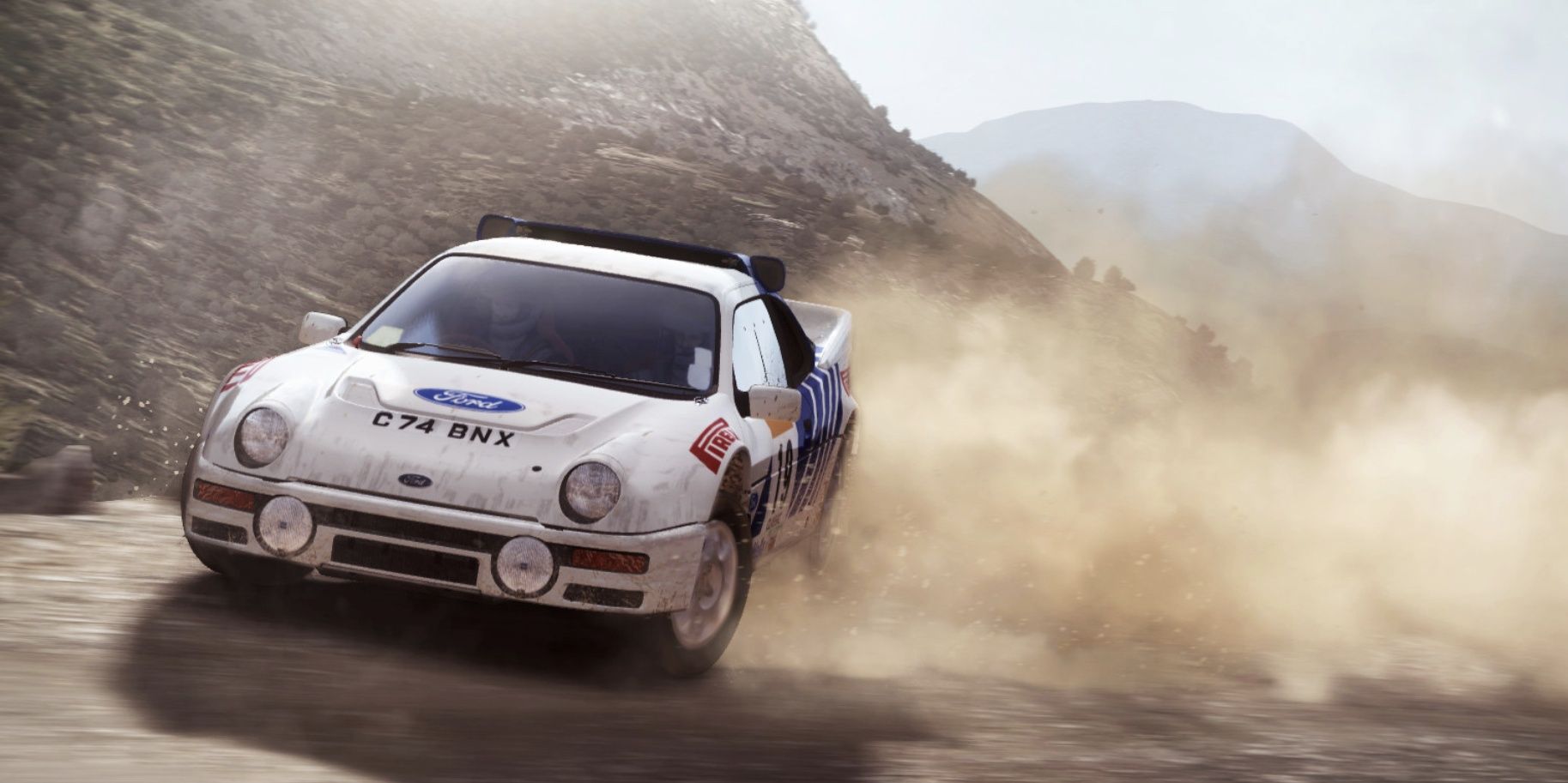 white car drifing in dirt rally