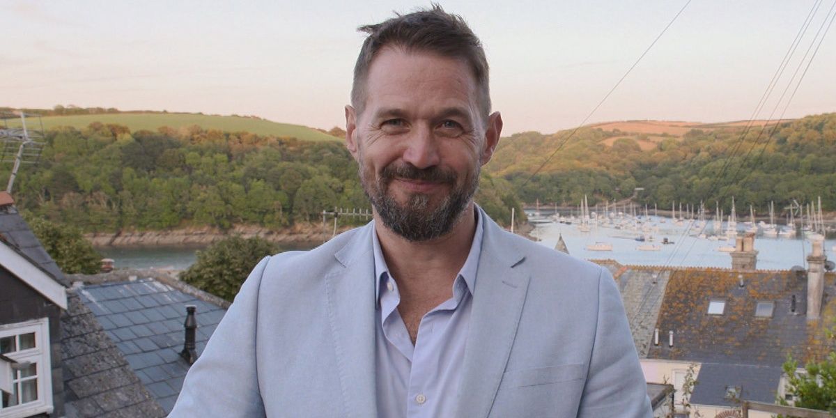Alistair Appleton standing on balcony