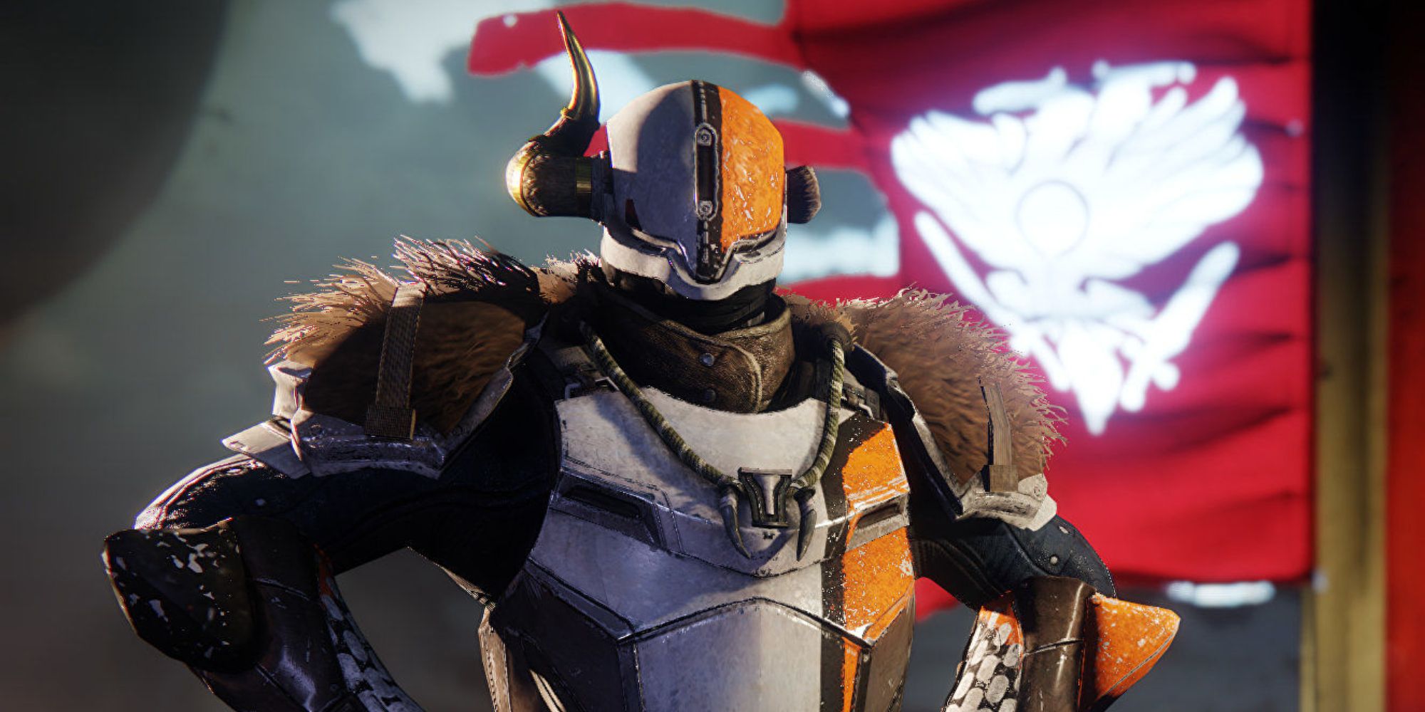 Destiny Lord Shaxx standing proudly with his hands on his hips and a red flag waving in the background