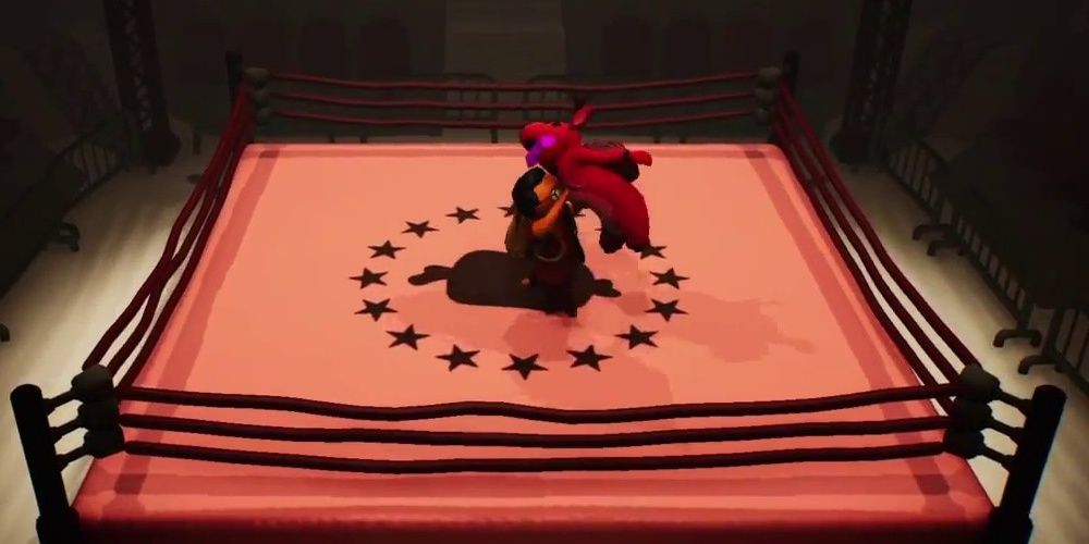 Gang Beasts performing the air drop move in the boxing ring