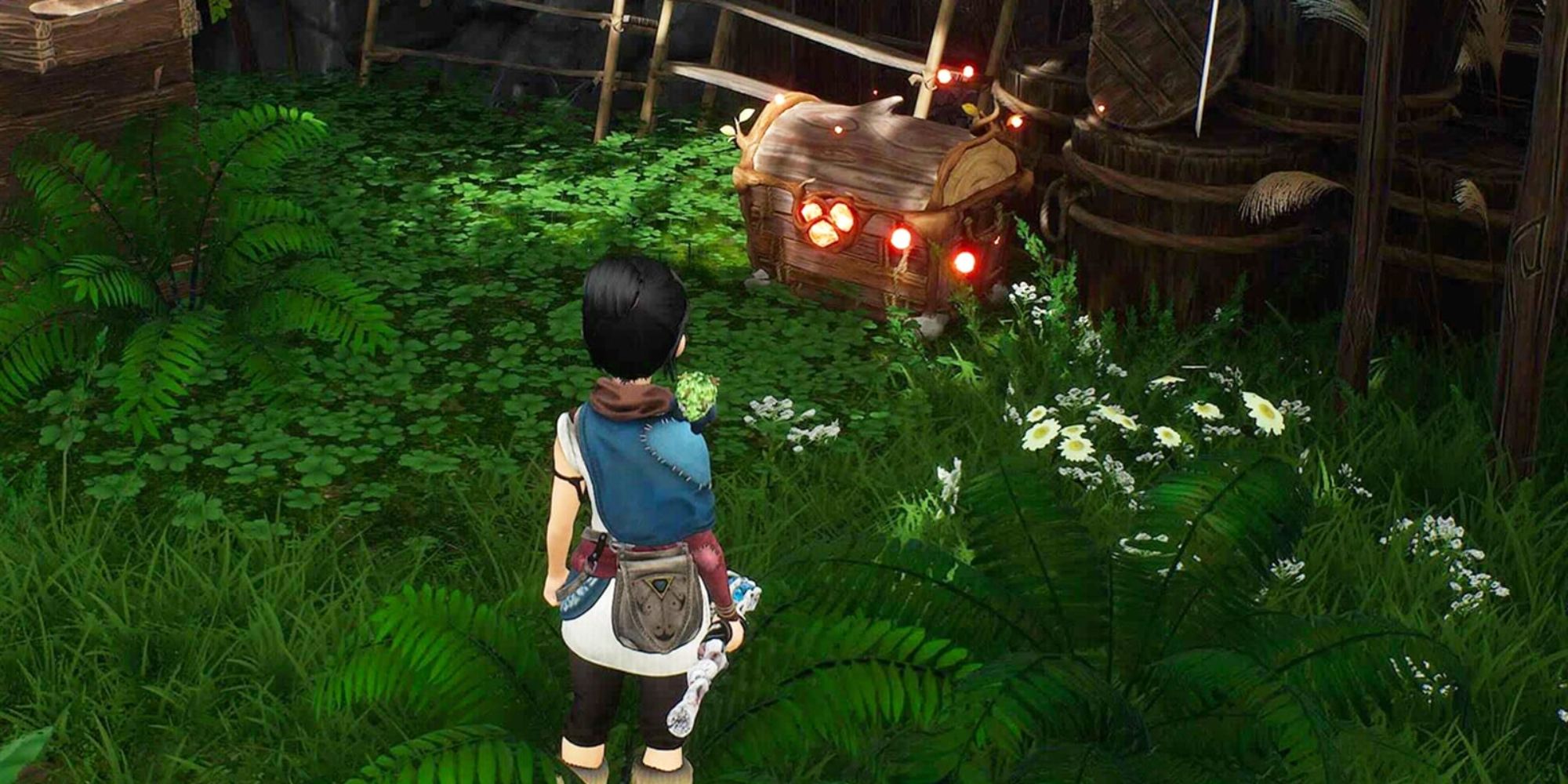 Kena Bridge of Spirits Kena stood in front of a glowing Cursed Chest near a wooden hut