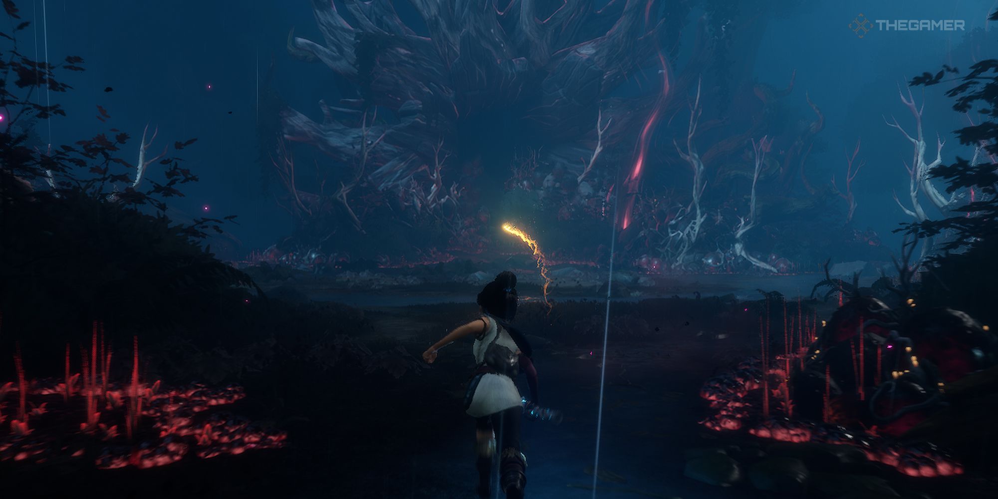 Kena running toward a giant dead tree. Everything is corrupted, tinted black and red.