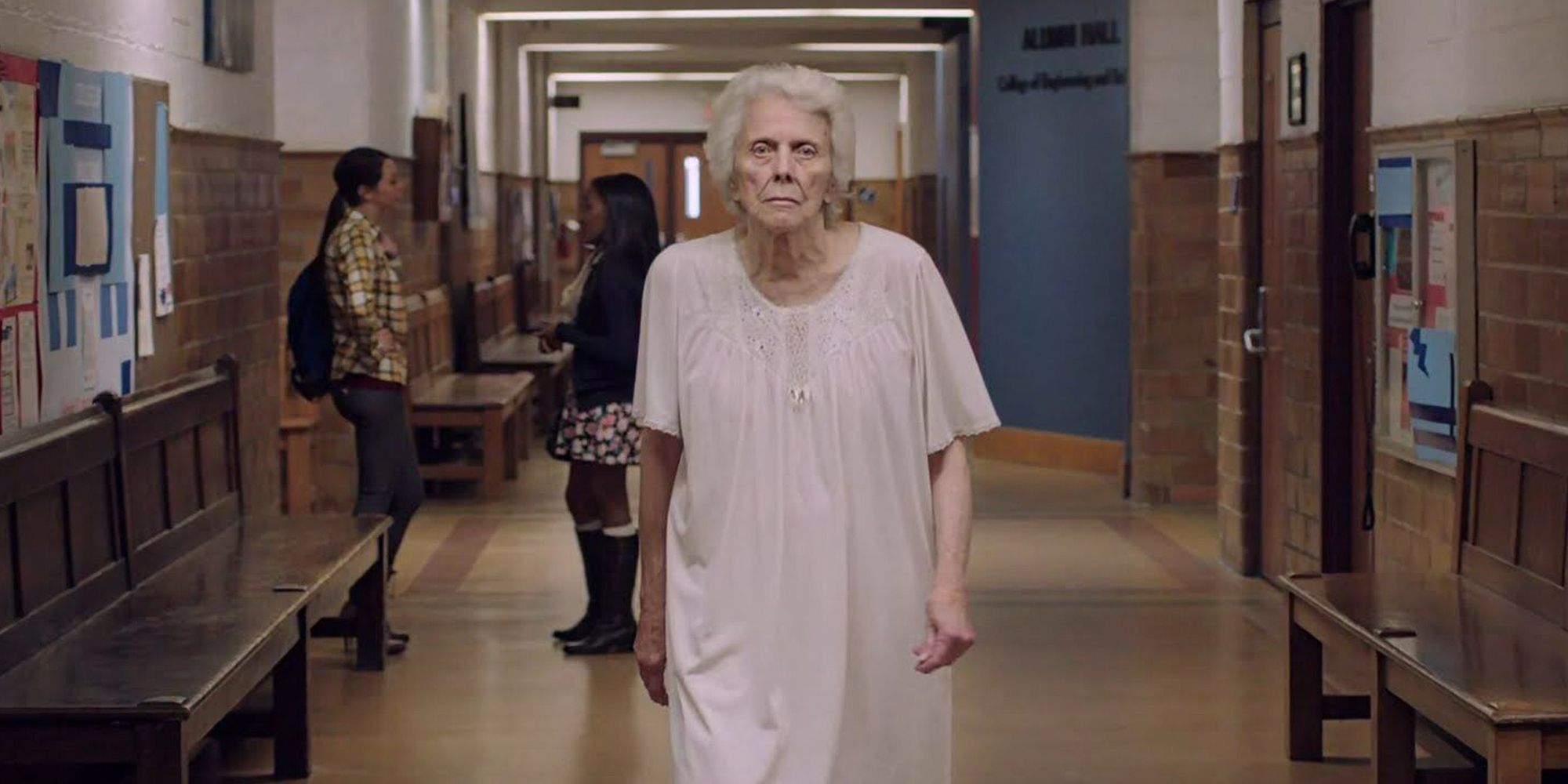 It follows, old woman following protagonist. Horror film.