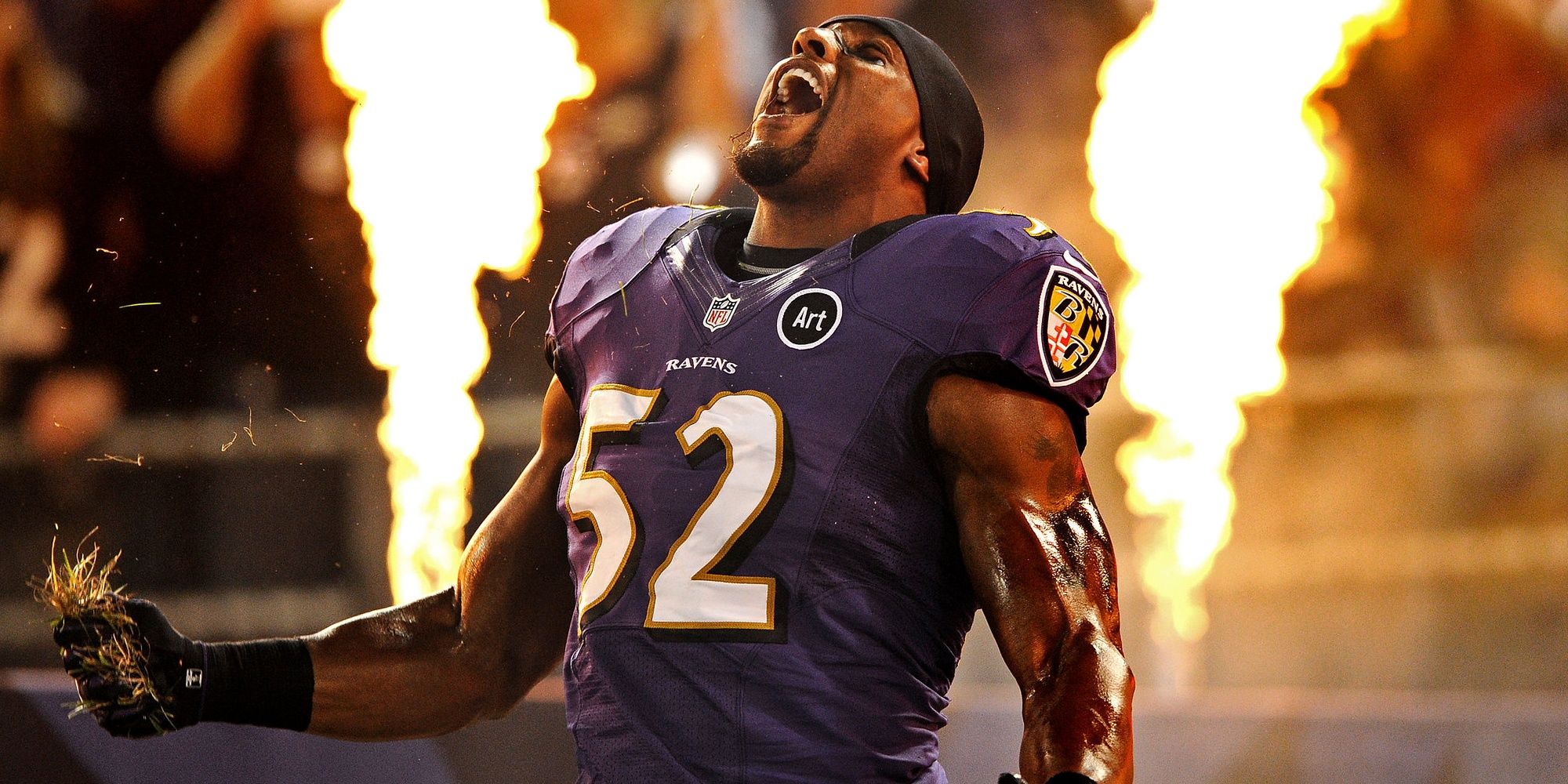 ray lewis celebrating with fire in background
