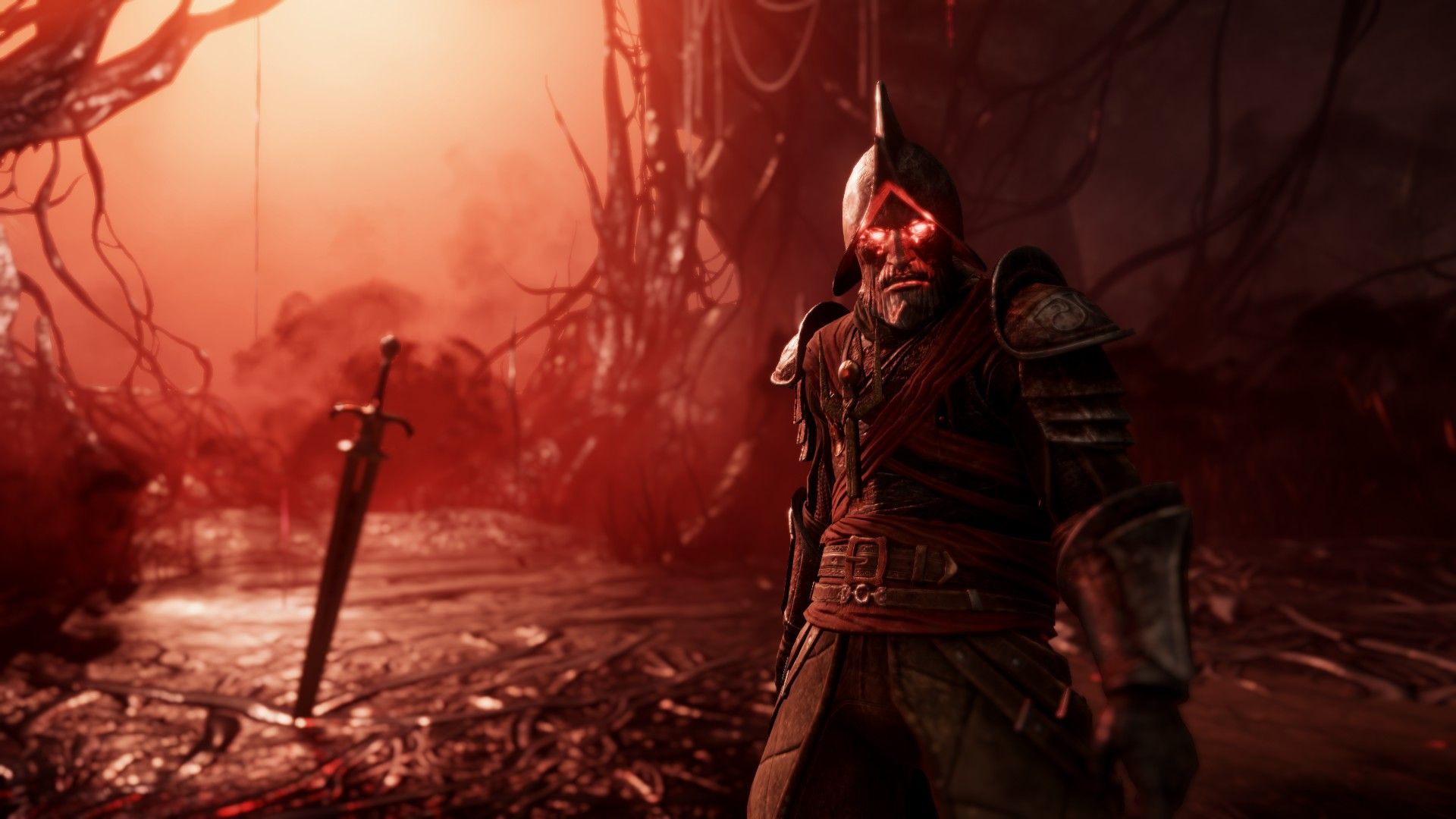 New World enemy with glowing red eyes stood by a sword in the ground