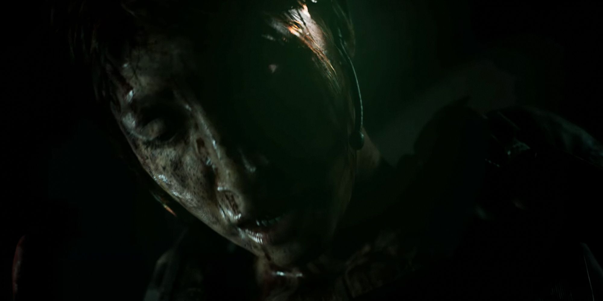 House Of Ashes. Rachel looking down worried. Close up shot. Dark lighting.