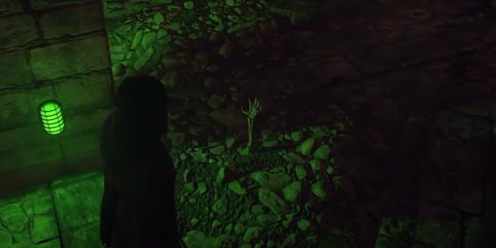 A Screenshot From Gameplay Of Skeletons Popping Out Of The Ground In Hitman's Sapienza Map.