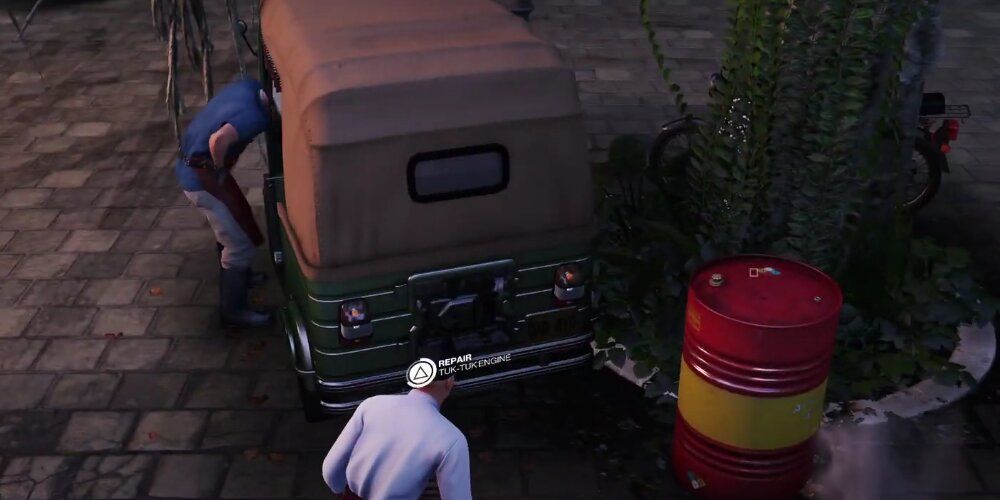 A Screenshot From Hitman Gameplay Showing Agent 47 In Bangkok Preparing To Sabotage The Tuktuk.