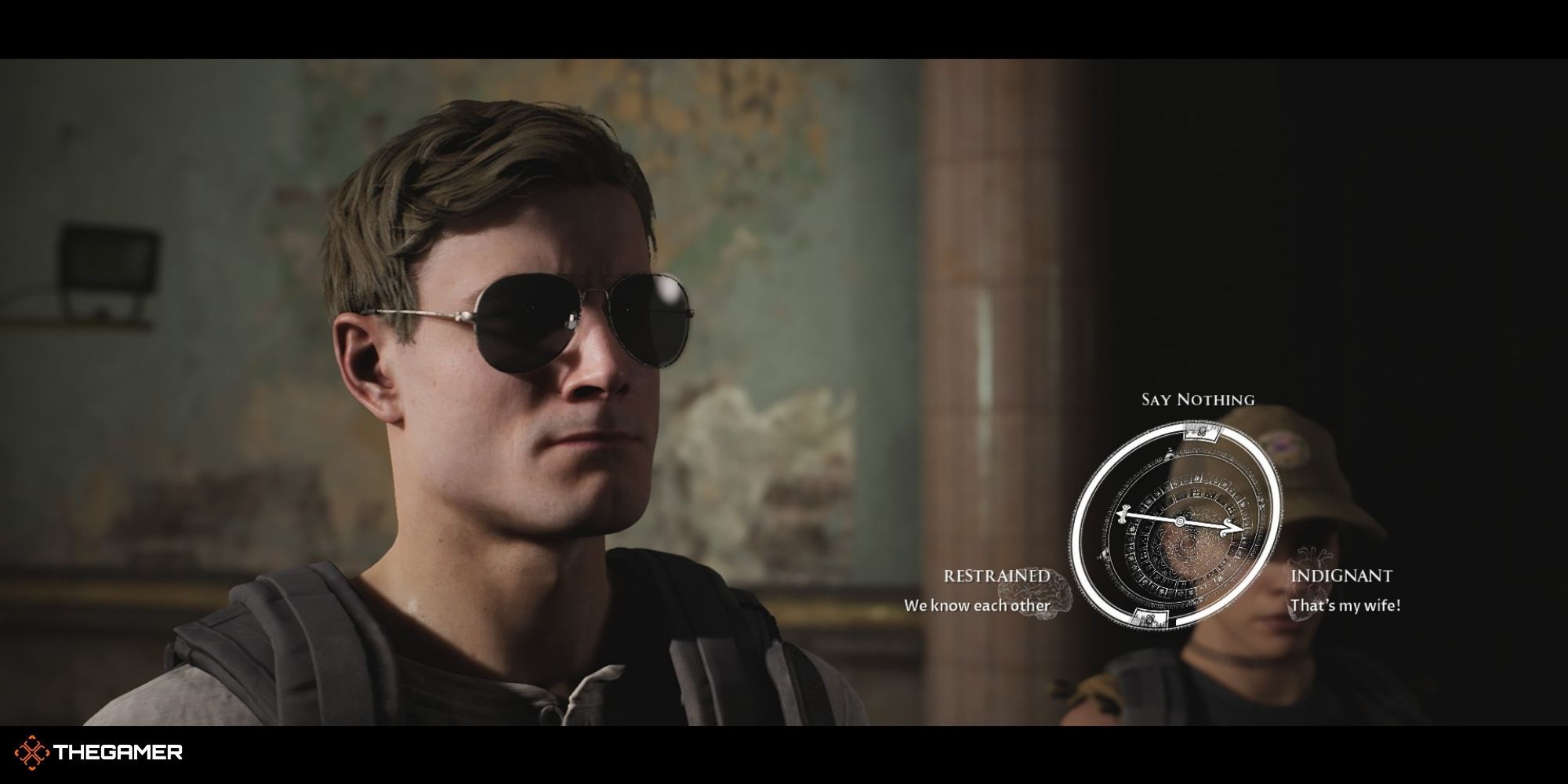 House of Ashes - The Raid - Erik King with Clarice next to a decision wheel