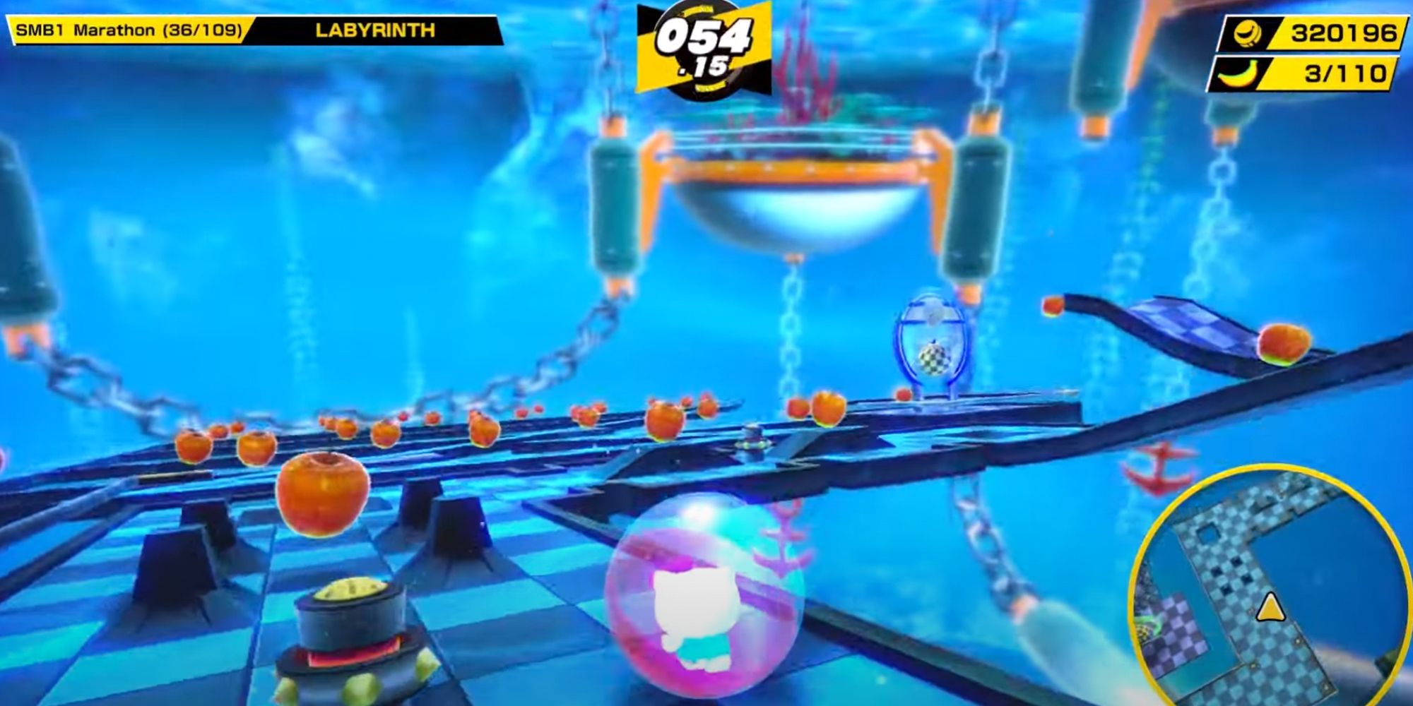 Super Monkey Ball Banana Mania. Labyrinth stage. Blue lighting with collectible apples up ahead.