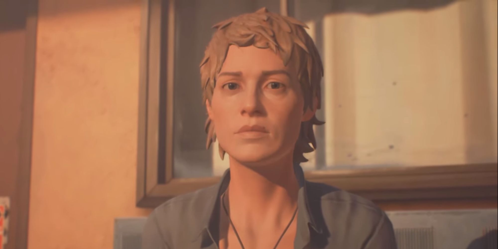 Life Is Strange 2 screenshot of Karen sat down, looking into camera.