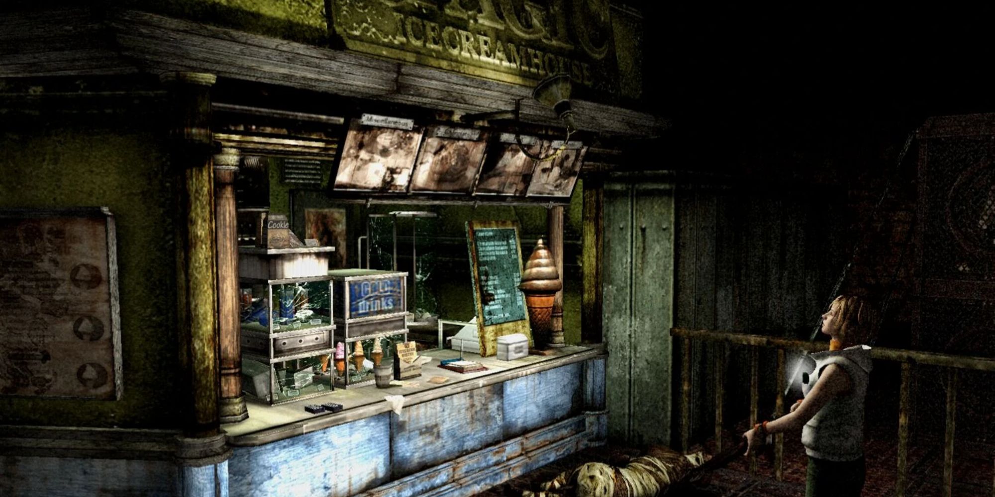 Heather ponders an ice cream stand in Silent Hill 3's Lakeside Amusement Park