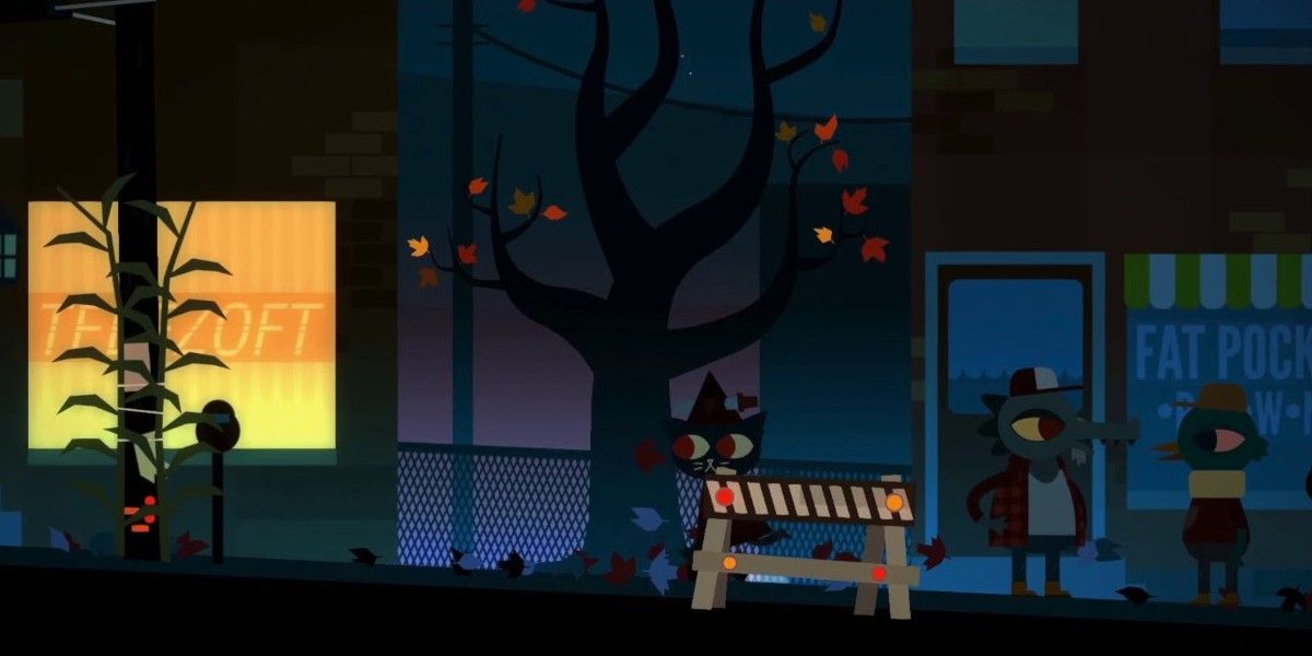 Mae on the street at night.