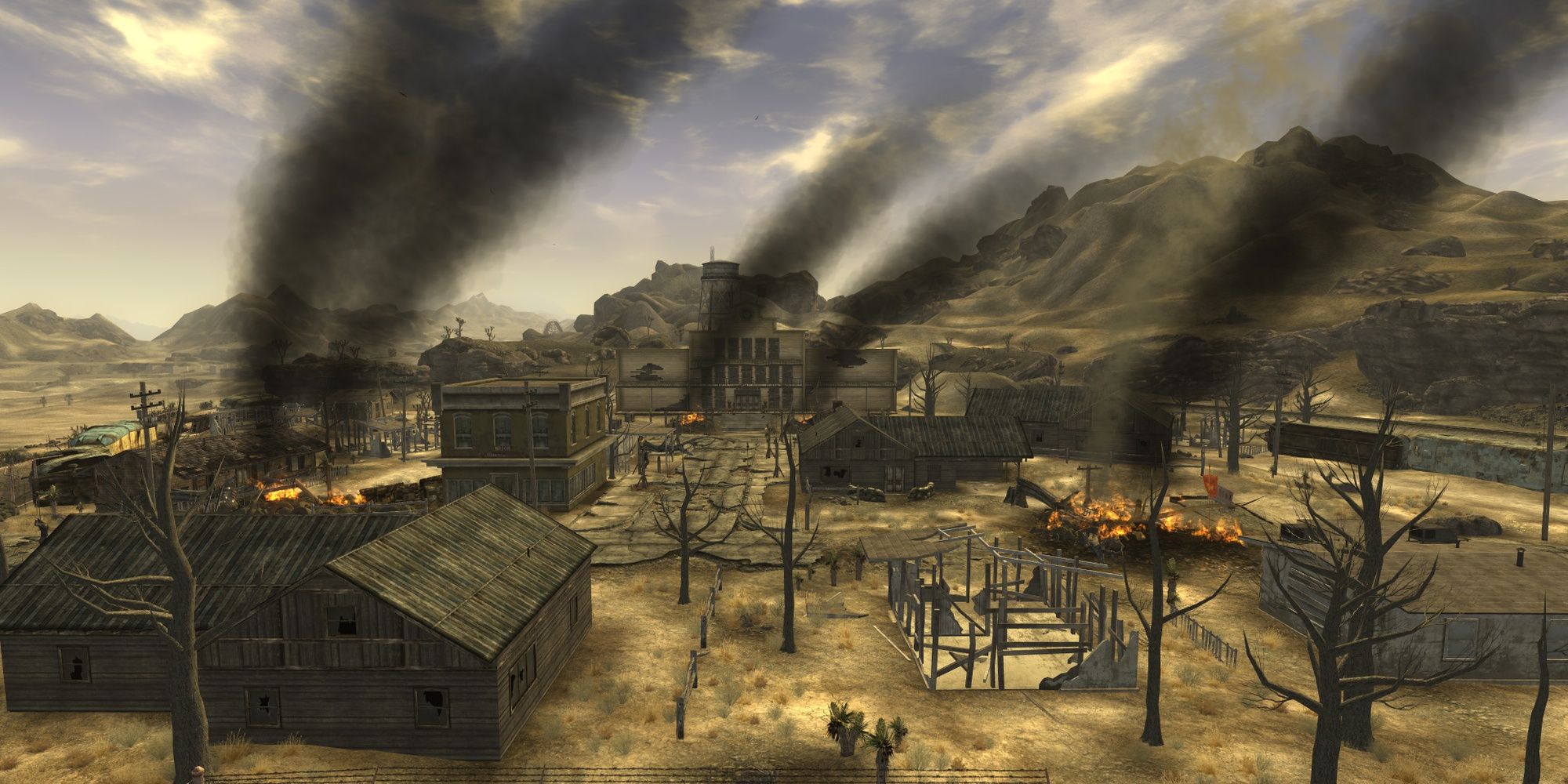 Fallout New Vegas Nipton ruins with burning debris