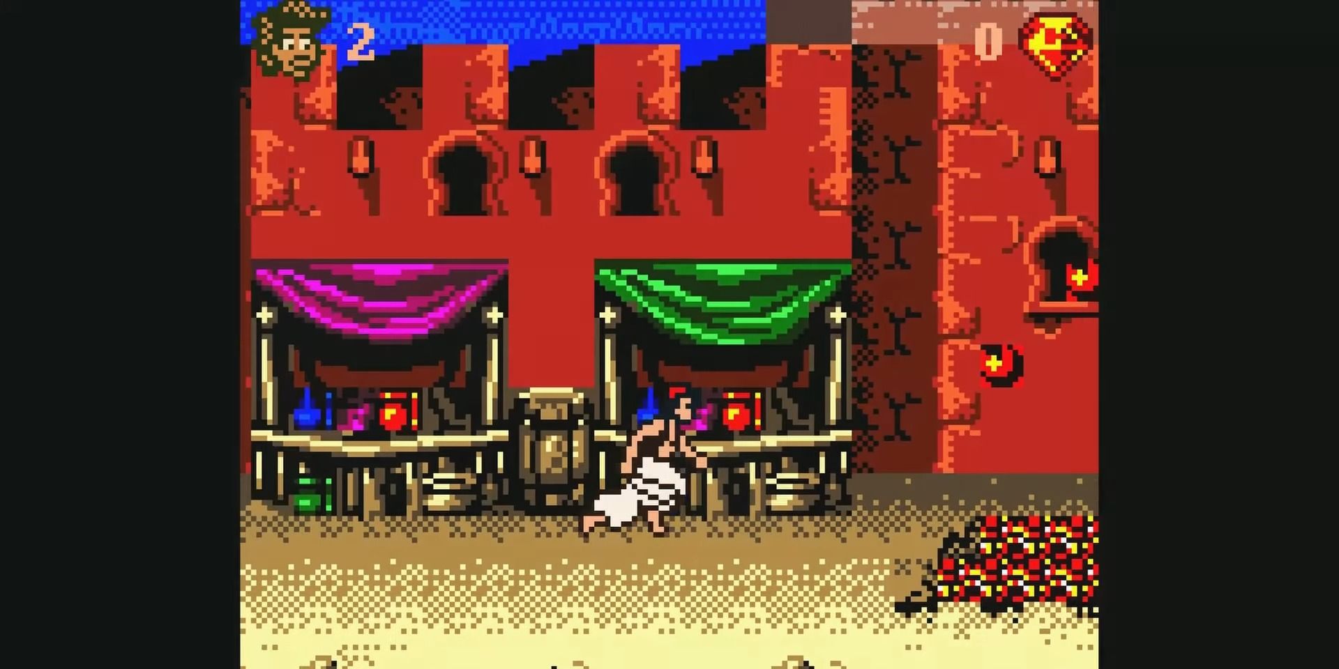 A screenshot showing gameplay from the Game Boy Color version of Aladdin in the Disney Classic Games Collection