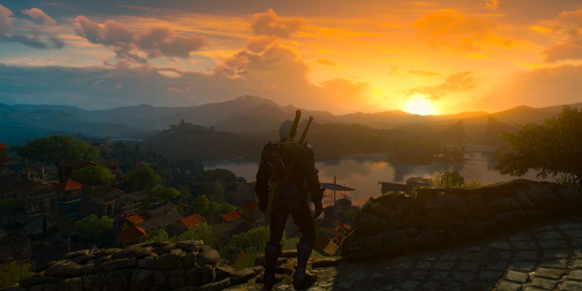 Geralt watches the sun set in The Witcher 3: Blood and Wine