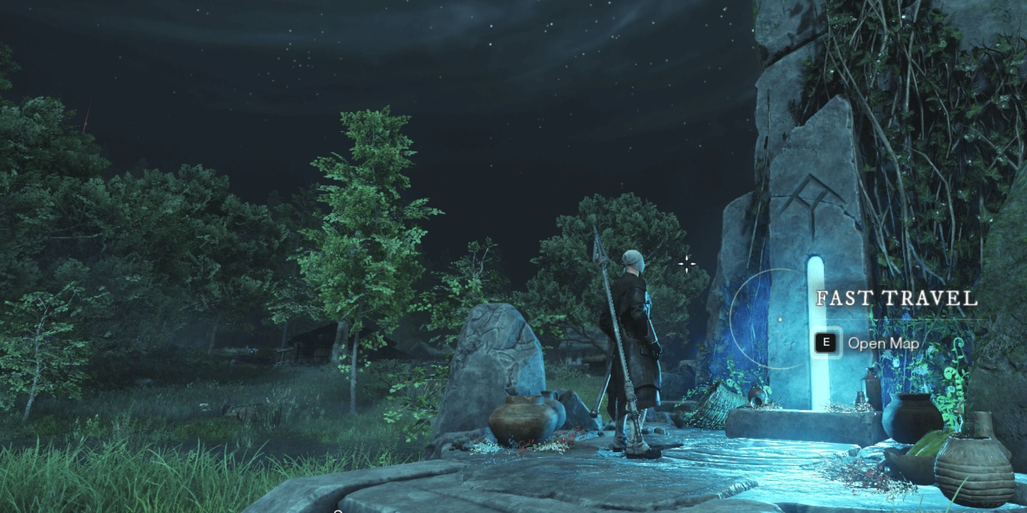 A player stands at a Fast Travel shrine in the middle of the wilderness at night