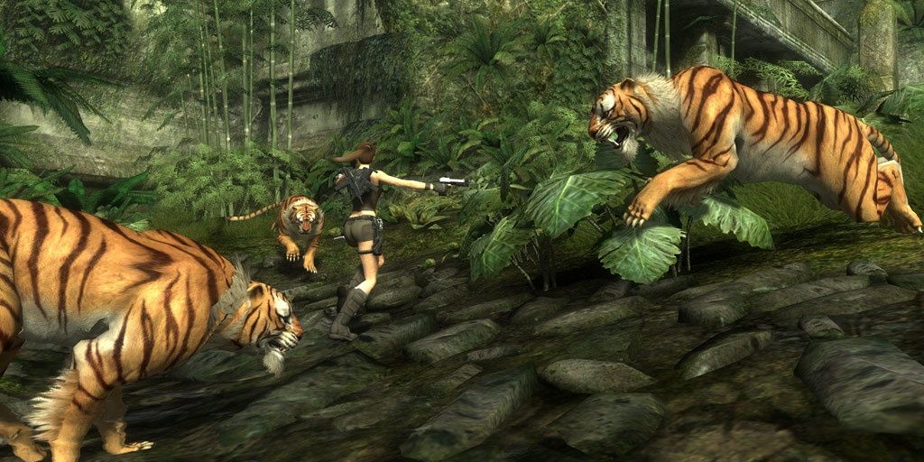 A screenshot showing Lara Croft fighting off tigers in Tomb Raider: Underworld