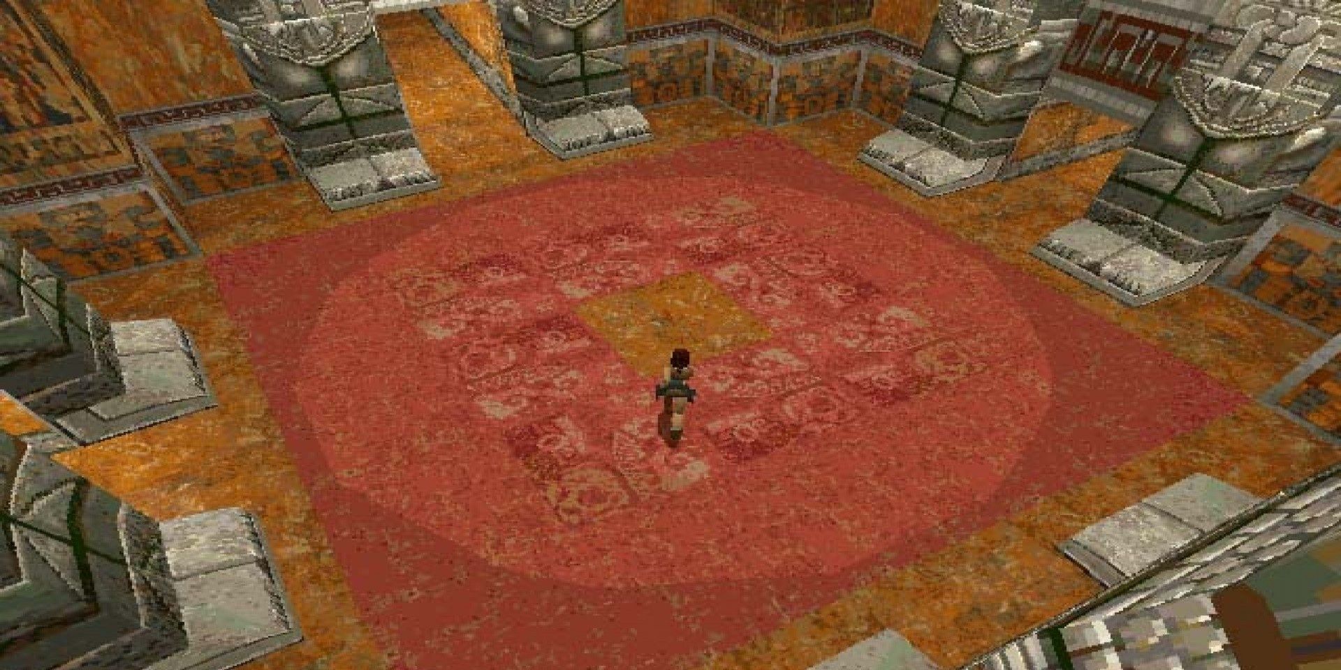 A screenshot showing Lara Croft running through a large room in Tomb Raider