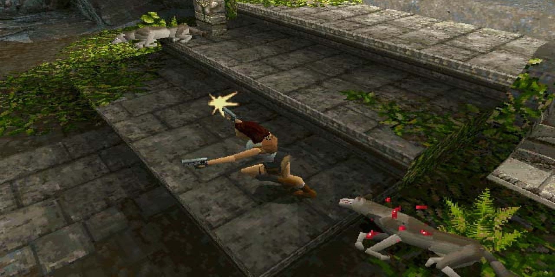 A screenshot showing Lara Croft fighting off a pack of wolves in Tomb Raider