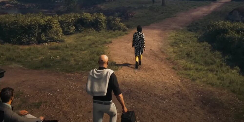 A Screenshot of Agent 47 In The Dartmoor Map From Gameplay of Hitman 3