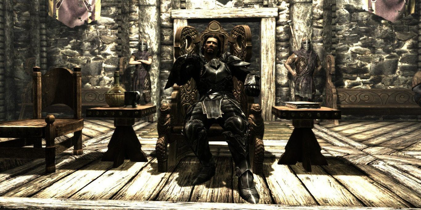 The Dragonborn sitting on the Jarl's throne in Riften