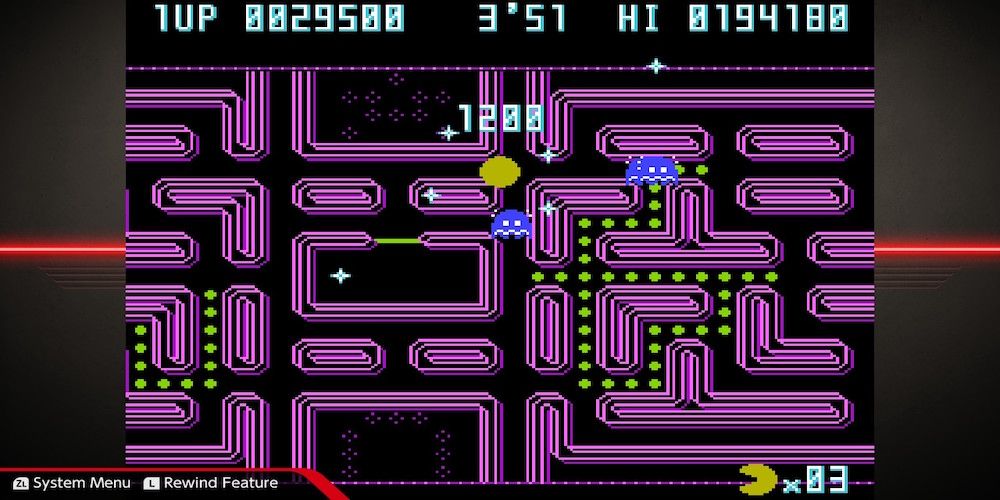Namco Museum Archives Vol. 1 Pac-Man Championship Edition a score of 1200 flashes as pac man eats a blue ghost