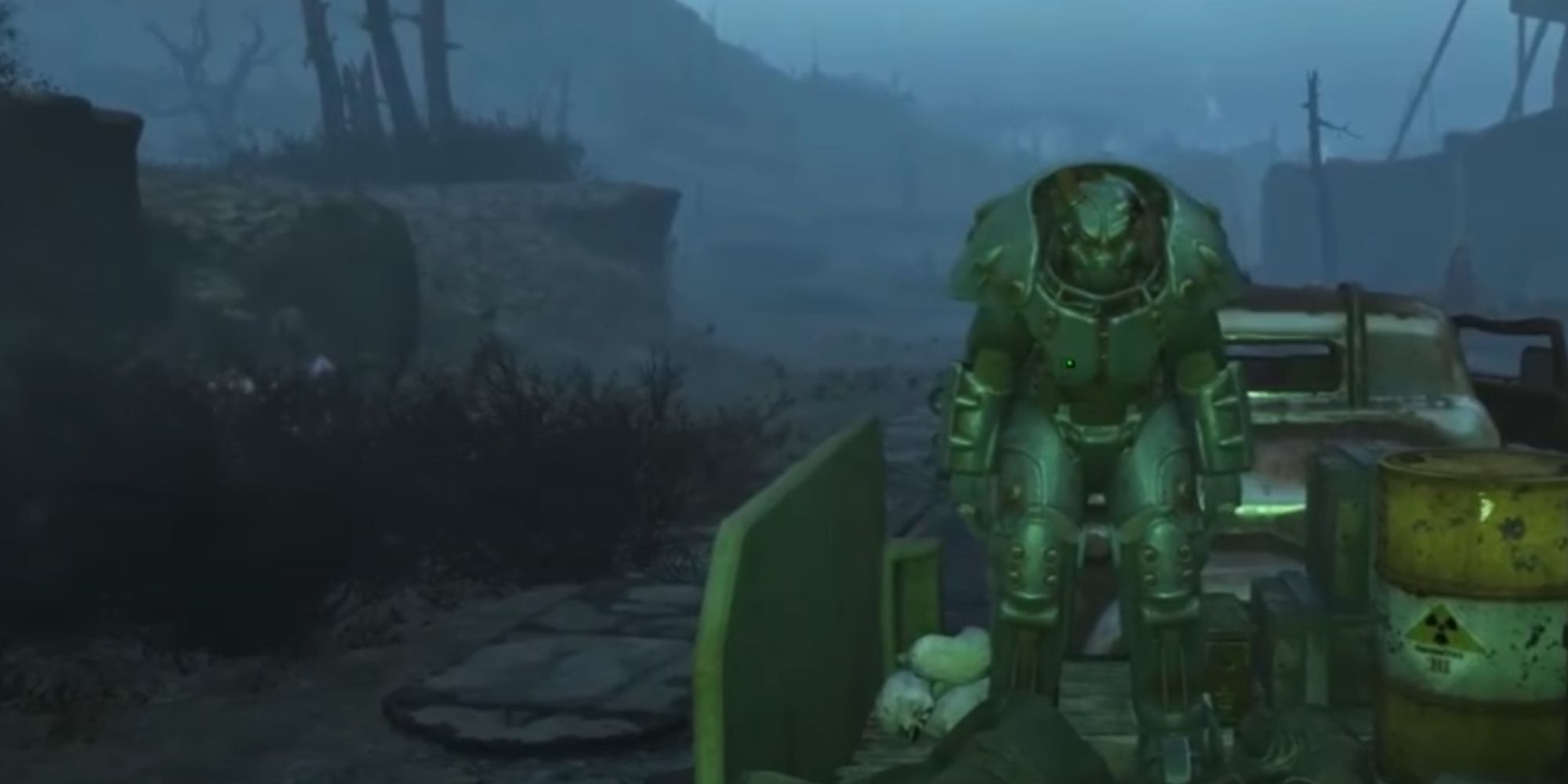 A power armor being transported on the back of a truck.