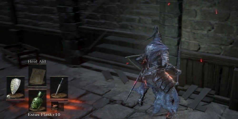 Dark Souls: A illusory wall fades away to reveal a staircase